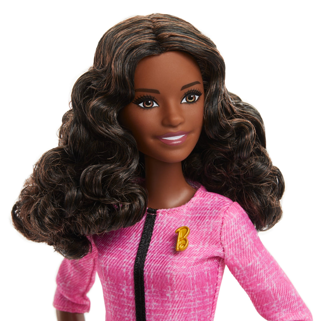 Barbie Future Leader Doll with Dark Brown Hair, 2 Golden Bracelets & Pin, Includes Sticker
